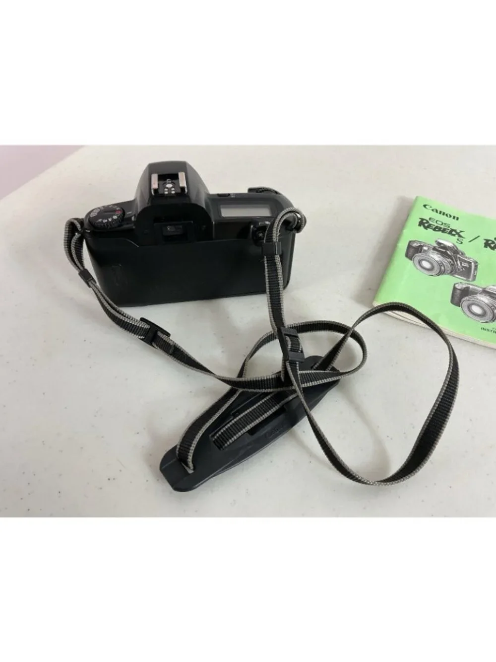 Canon EOS Rebel X S 35mm SLR Film Camera with Strap & Booklet Film Included